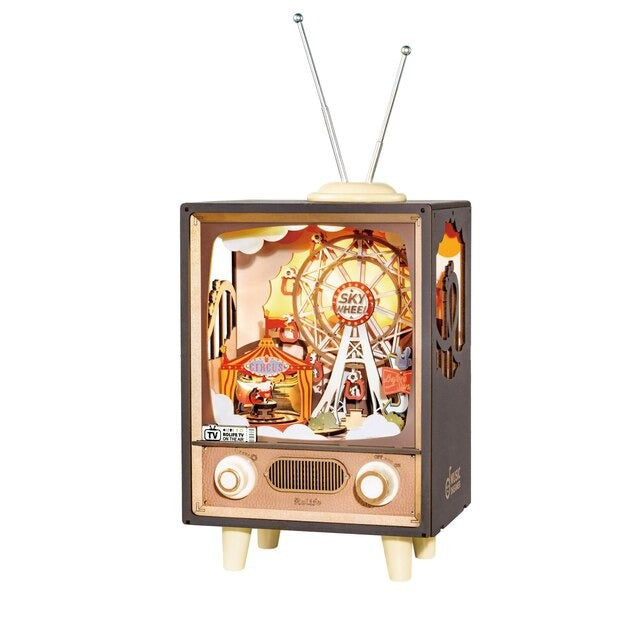 Music and light box with circus tent and ferris wheel in TV display