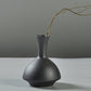 Black ceramic vase with textured glaze