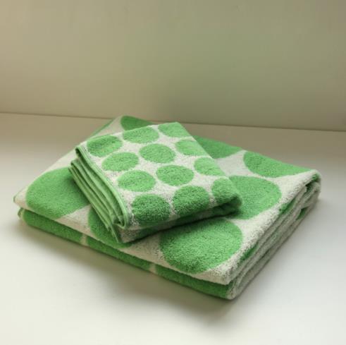 Cotton towels with green spots