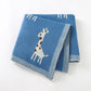 Blue cotton knit blanket with giraffes