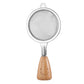 Stainless steel strainer with wooden handle and smiley face