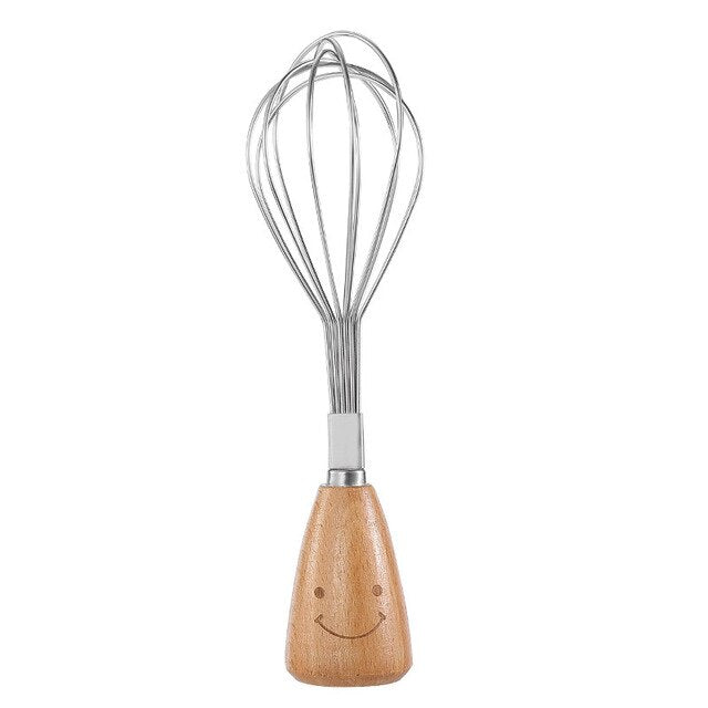 Stainless steel whisk utensils with wooden handle and smiley face