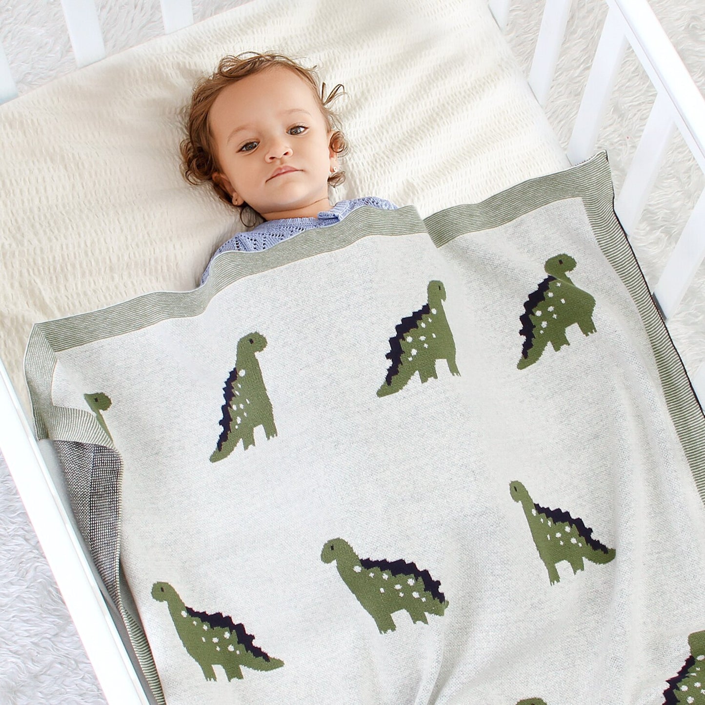 Cotton knit dinosaur baby blanket