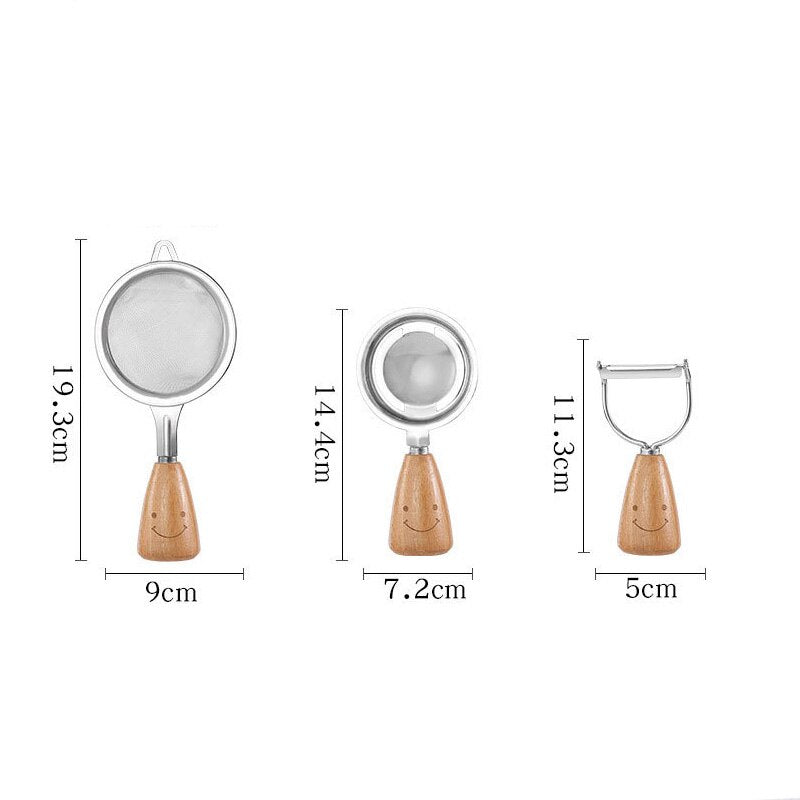 Stainless steel kitchen utensils with wooden handle and smiley face