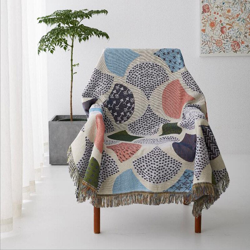 Blanket rug nordic modern pattern pink blue green cream on chair