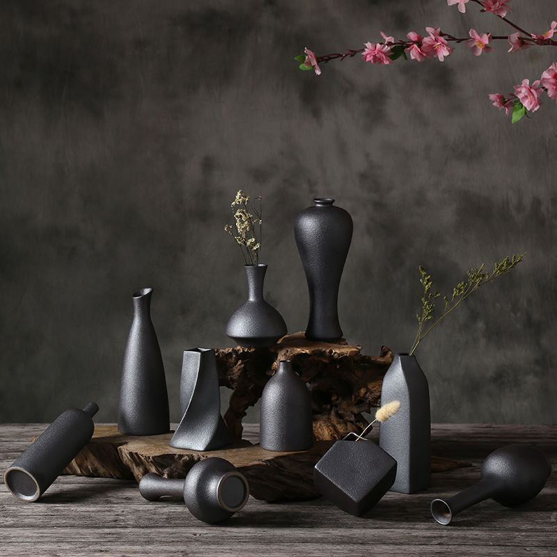 Black ceramic vases in various shapes