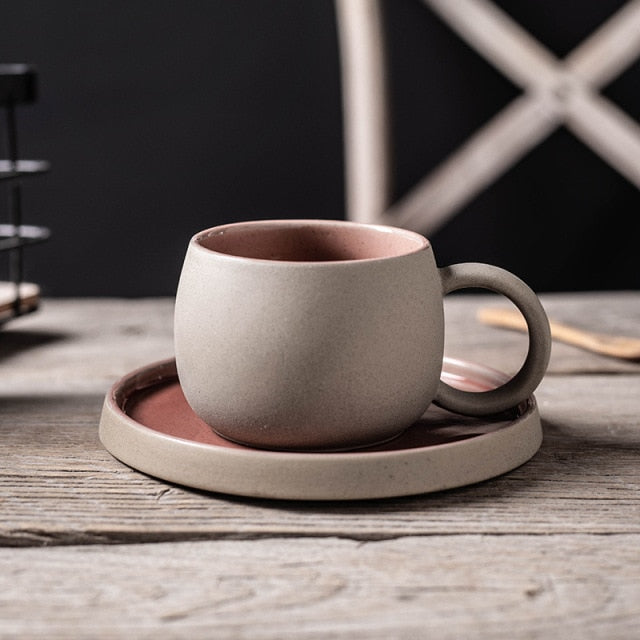 Pink rounded shape ceramic mug and plate