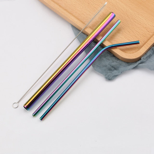 Three rainbow carnival stainless steel straws with cleaning brush