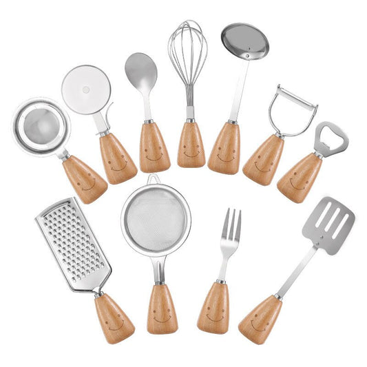 Stainless steel kitchen utensils with wooden handle and smiley face