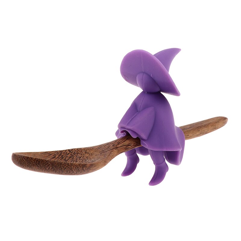 Purple witch on wooden spoon