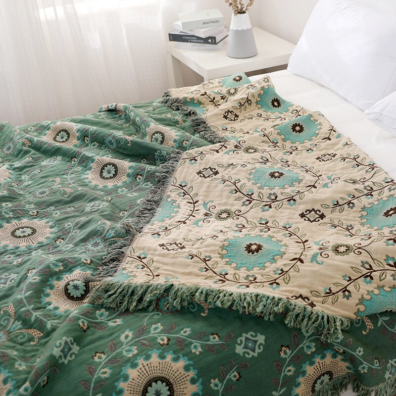 Green and cream double sided fringed throw blanket with floral design