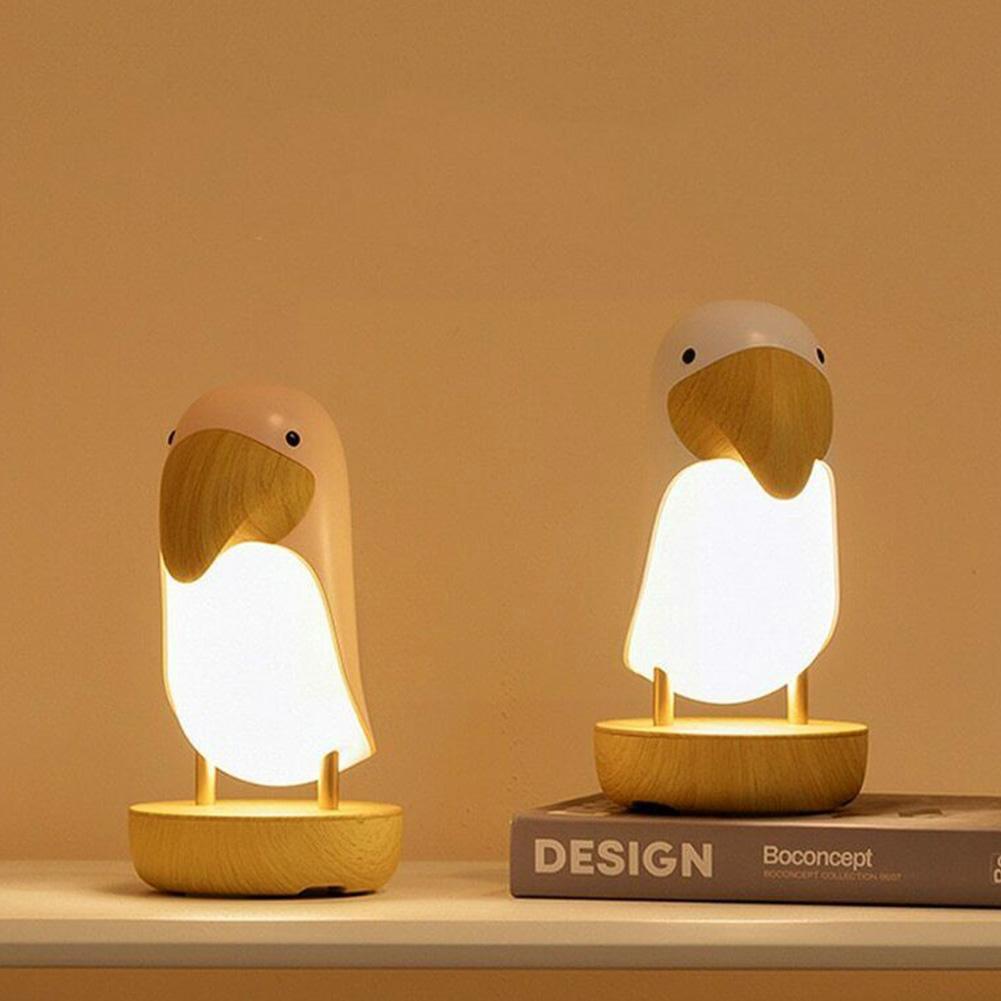 Two toucan night lights with book