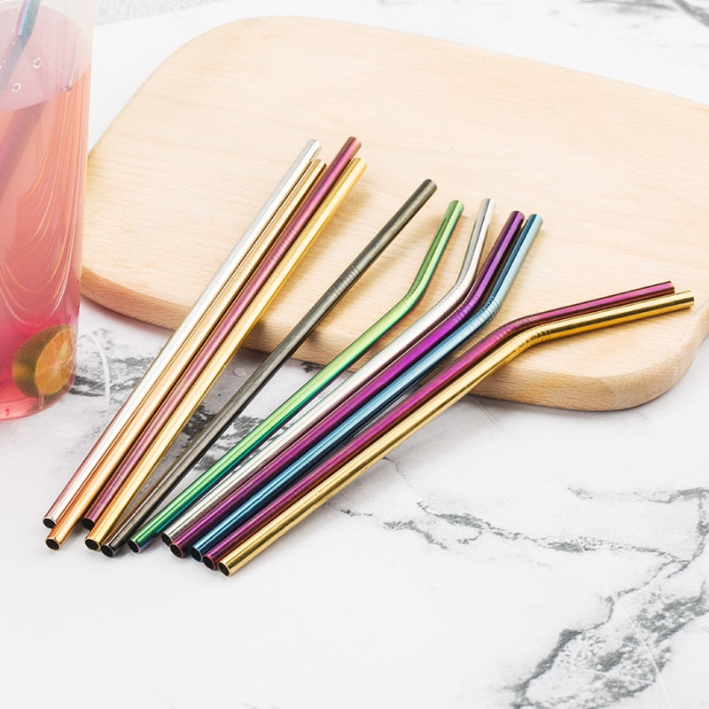 Bent and straight metal straws in various colours