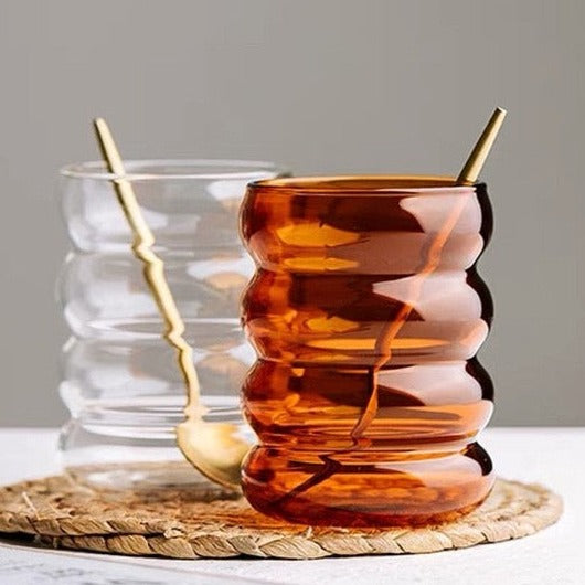 Clear amber wave shaped drinking glasses