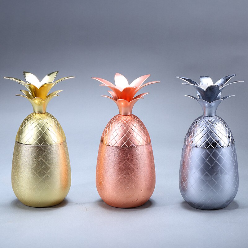 Metallic pineapple cocktail mugs in gold rose copper and silver shown with top on