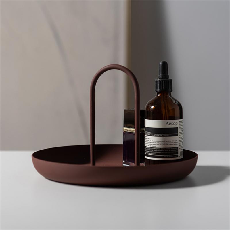 Modern tray with handle with skincare items