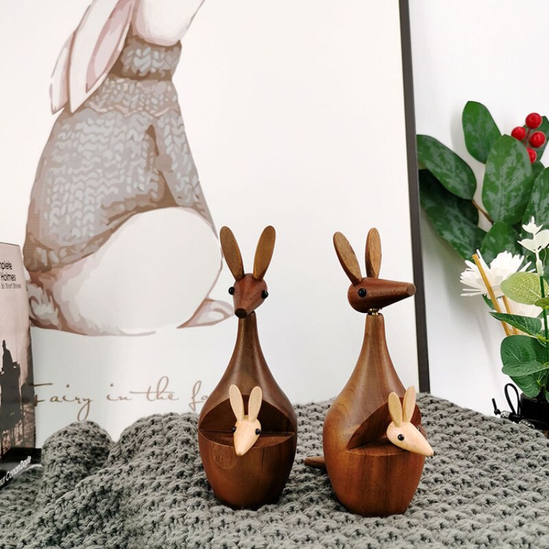 Solid wood kangaroos with their joeys in contrasting timber colours