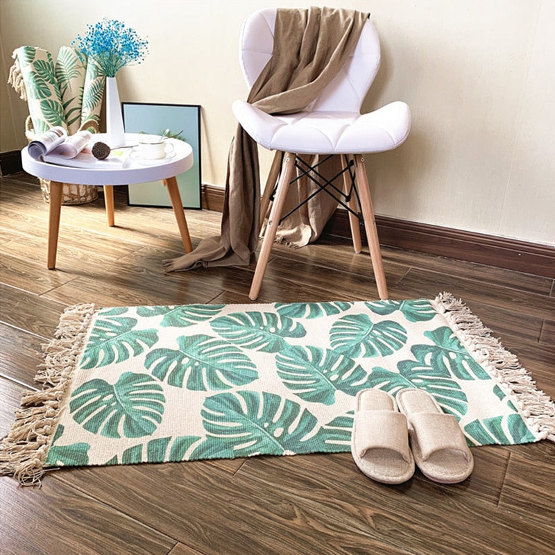 Palm leaf rug with fringe slippers chair and table