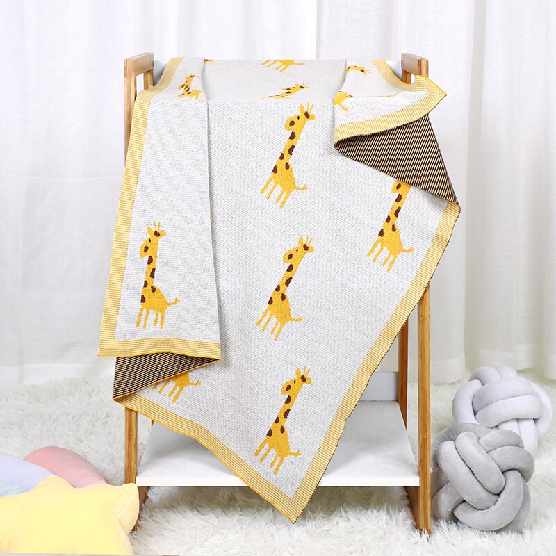 Cream cotton knit blanket with giraffes