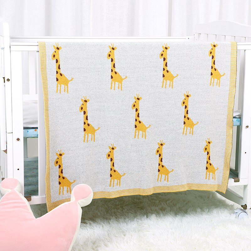 Cream cotton knit blanket with giraffes