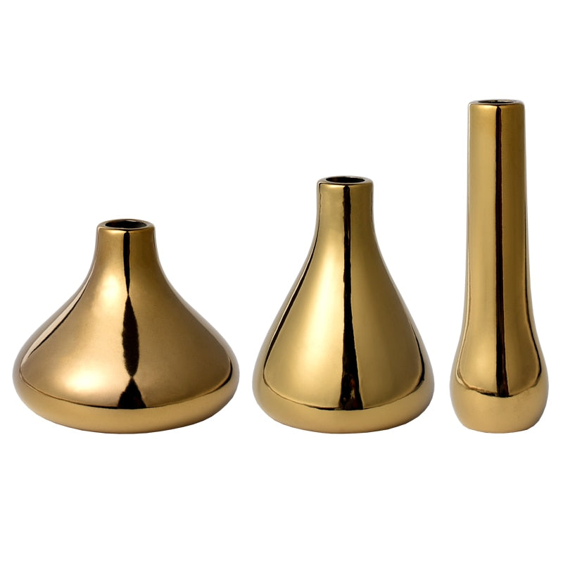 Three gold vases