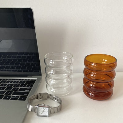 Clear amber wave shaped drinking glasses