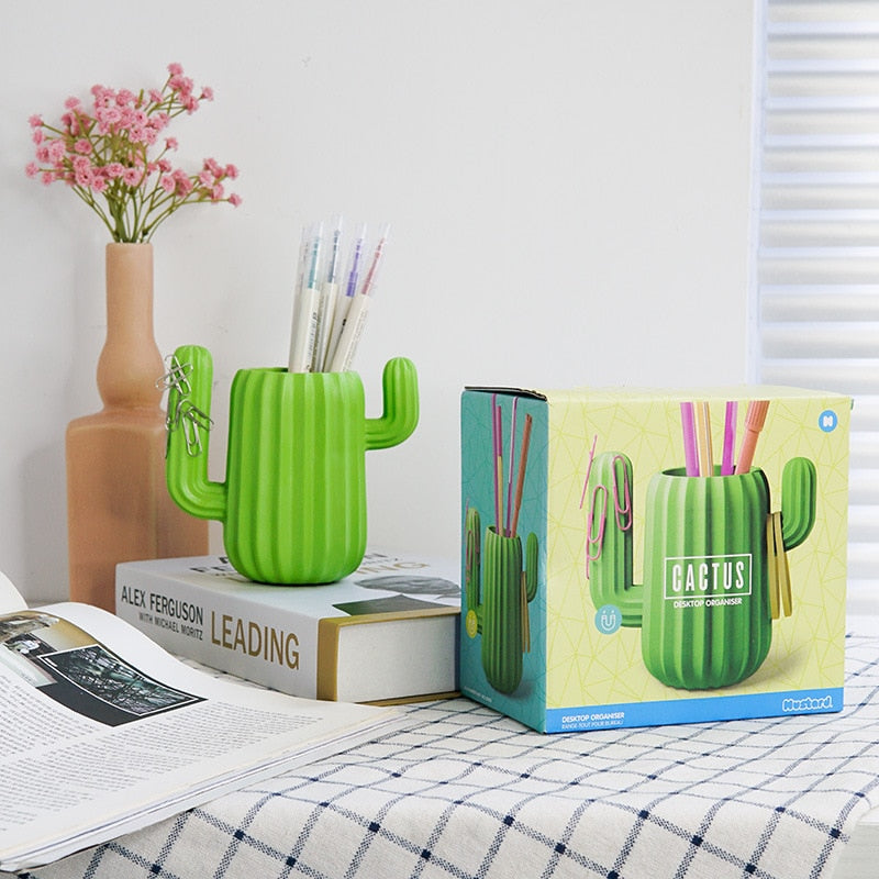 Green cactus shaped desktop organiser