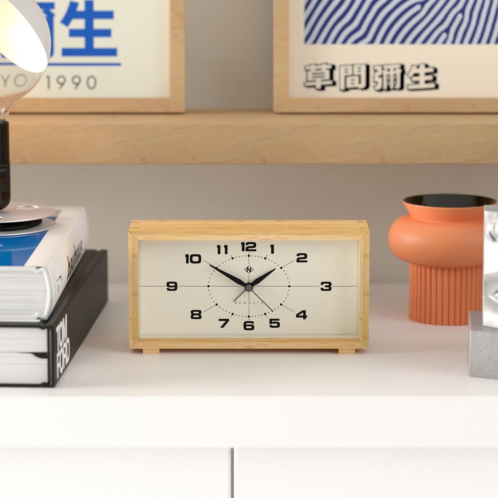 Retro inspired rectangular alarm clock made from bamboo with cream face on shelf