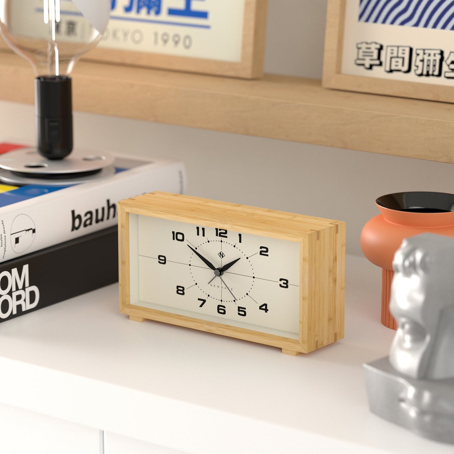 Retro inspired rectangular alarm clock made from bamboo with cream face on shelf