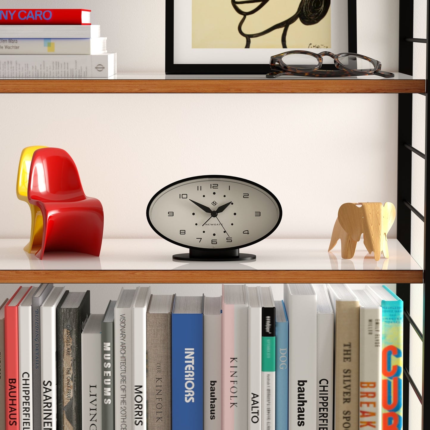 Black oval retro-inspired alarm clock on base