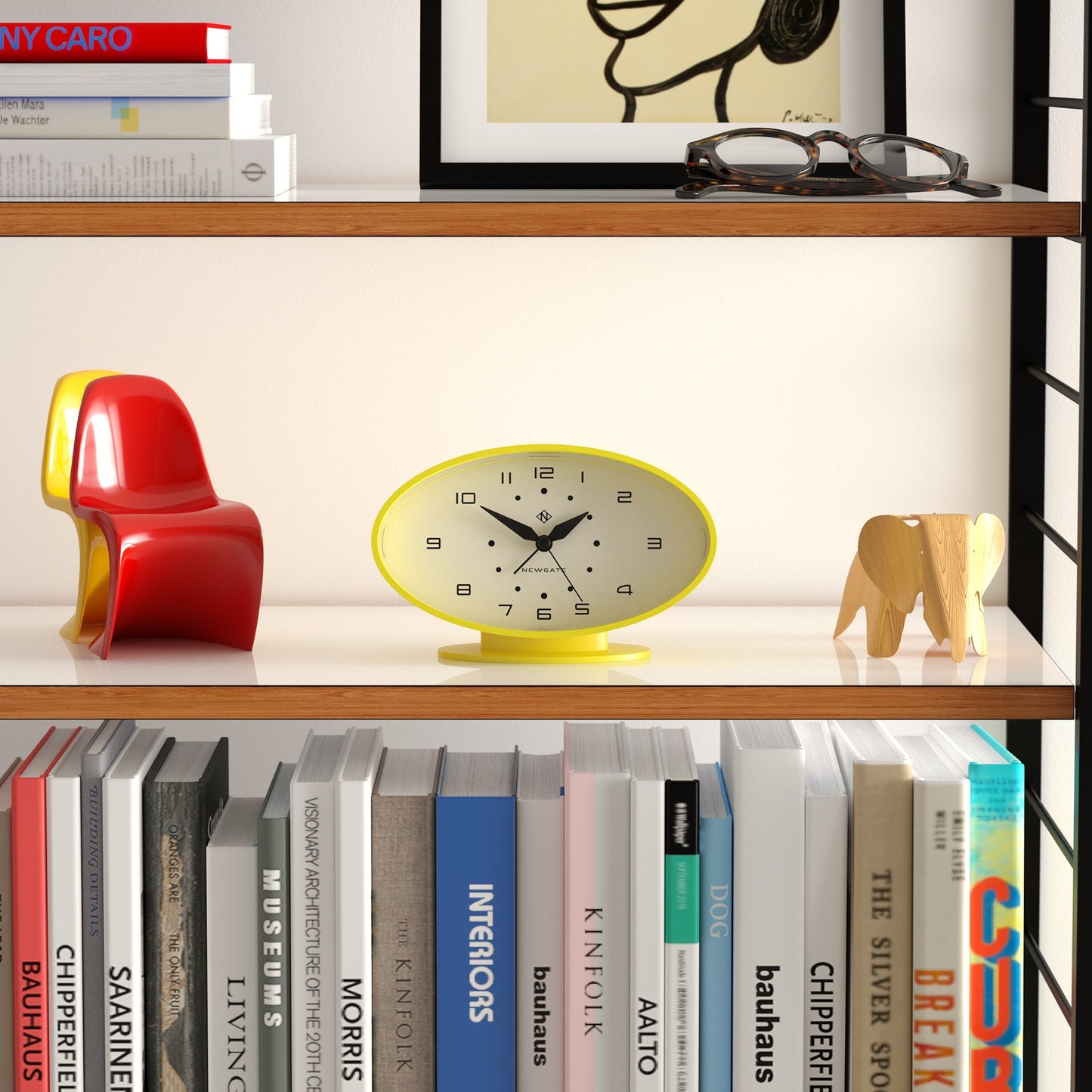 Yellow oval retro-inspired alarm clock on base