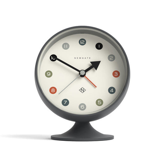 Grey round retro-inspired alarm clock on base