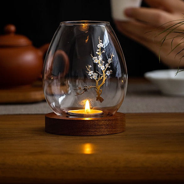 Glass candle holder with blossom image and timber base