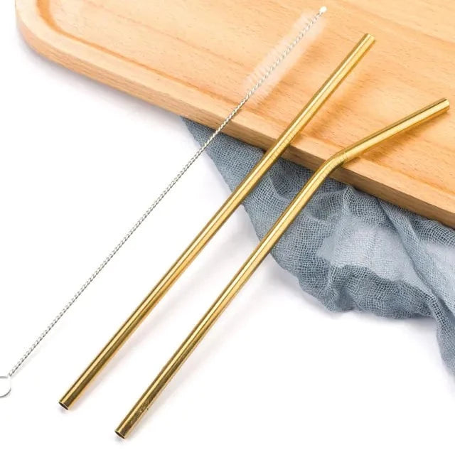 Two gold stainless steel straws with cleaning brush