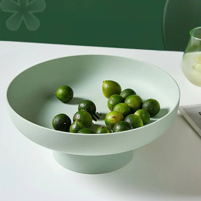 Mint green rounded elevated bowl with limes