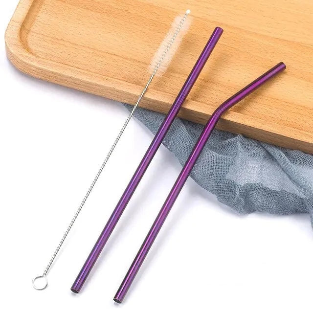 Two purple stainless steel straws with cleaning brush