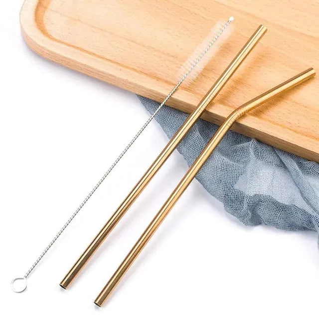 Two rose gold stainless steel straws with cleaning brush