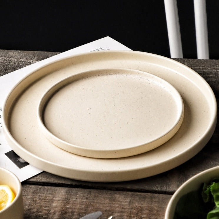 Cream plates on timber table