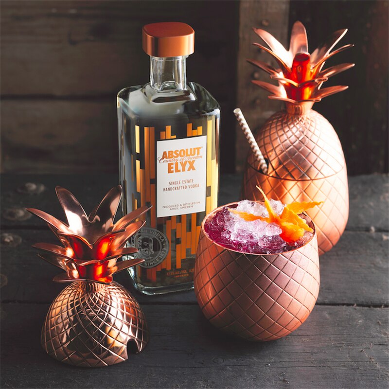 Rose copper metallic pineapple cocktail mug shown with top on and off