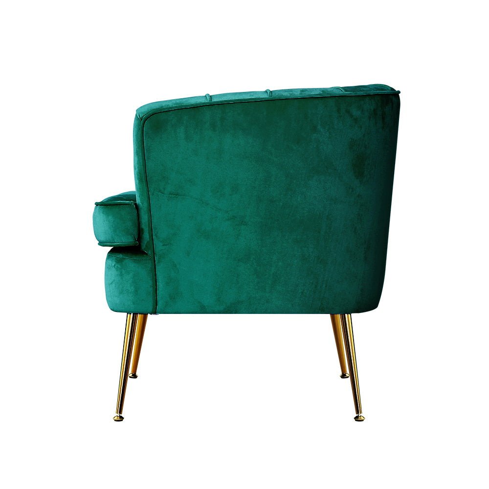 Green velvet vintage-inspired tub chair with golden legs