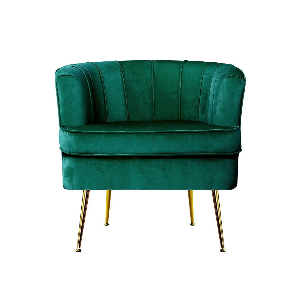 Green velvet vintage-inspired tub chair with golden legs