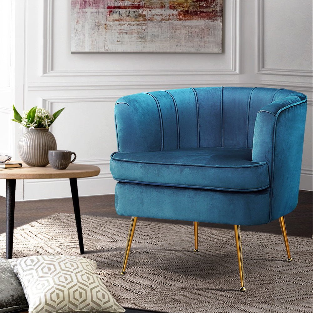 Blue vintage inspired velvet armchair with metal legs