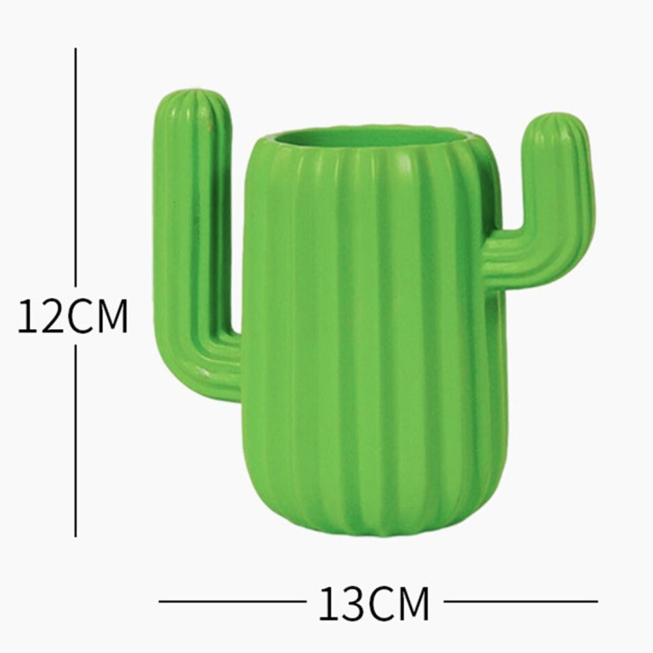 Green cactus shaped desktop organiser