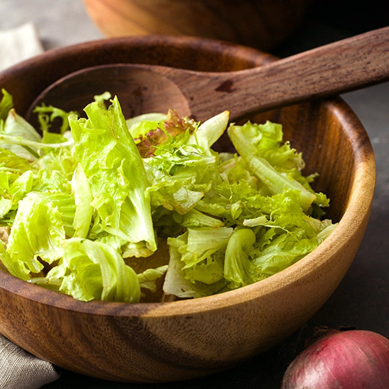 Wooden bowl spoon salad