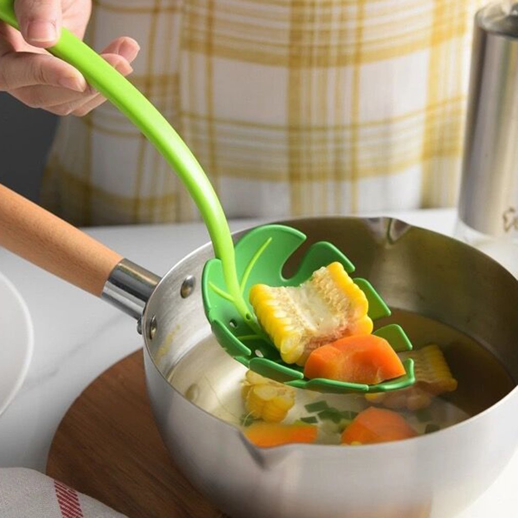 Palm leaf colander spoon with vegetables