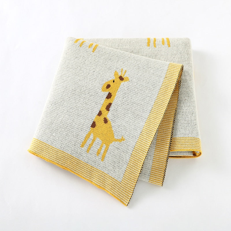 Cream cotton knit blanket with giraffes