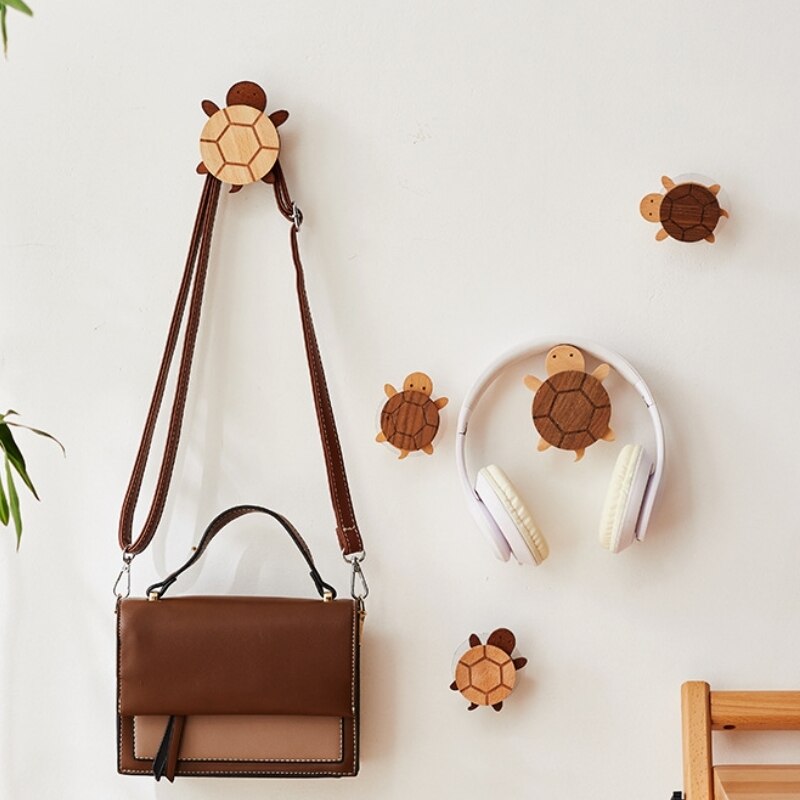 Timber wood turtle wall hooks with bags and headphones