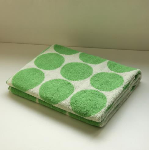 Cotton towel with green spots