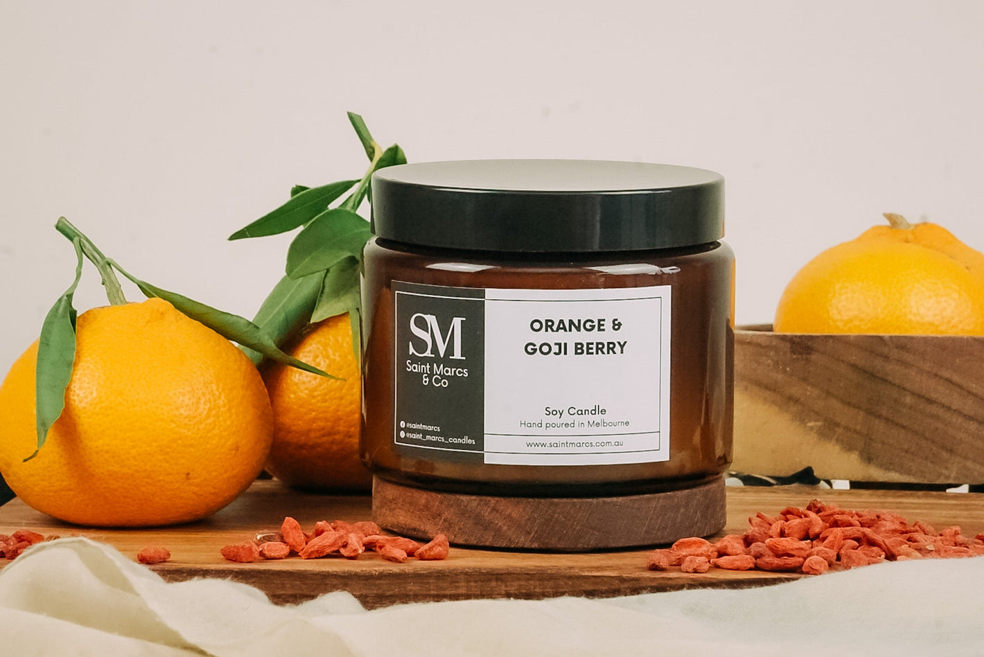 Orange and Goji Berry soy candle in amber coloured jar