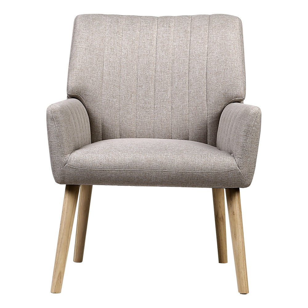 Beige upholstered armchair with wooden legs